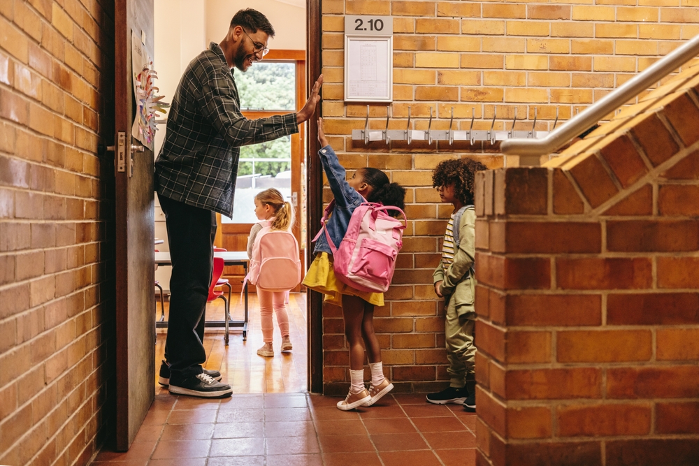 Teacher Greeting His Students